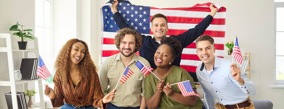 Friends people flags USA independence celebration patriotism. Diversity shown with a group smiling, holding US flags and a banner, perfect for holiday ads. USA unity and pride theme.
