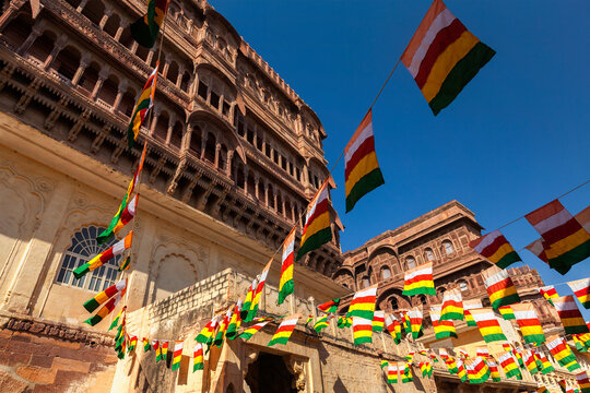State flags of Jodhpur-Marwar in Meharngarh fort with blue sky in Jodhpur, Rajasthan, India