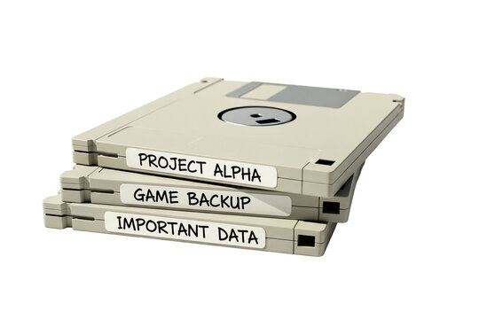 Stack of three vintage floppy disks with labels