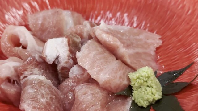 Close-up of premium akami and chutoro tuna sashimi beautifully arranged on a serving plate, highlighting fresh texture and authentic Japanese fine dining.