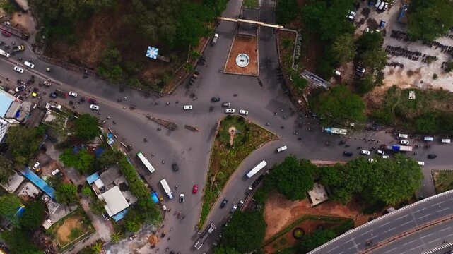 Bhel Circle with BHEL Entrance, traffic flow and flyover at Lingampally, chanda nagar, hyderabad, telangana, india. day time, parallax shot, drone shot, 4k.