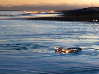 Sunset Ice Jewel Glinting on Otsu Coast Shoreline © YUTAKA