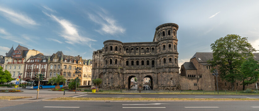 Panoramic View of the Porta Nigra in Trier, Germany Under Dramatic Evening Sky