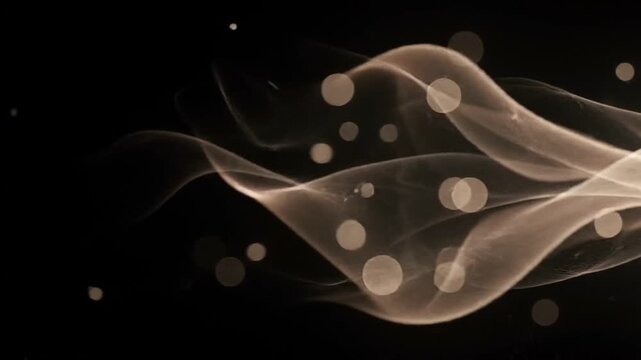 Warm abstract smoke wisps with bokeh on black background