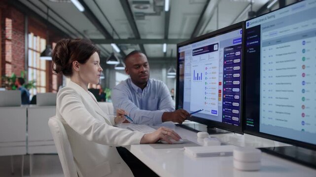 Compliance Manager And Colleague Review Risk Control Software