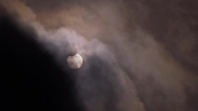 Partial Solar Eclipse of June 10 2021 Visible Through Clouds