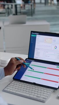 Procurement Manager Works On Laptop