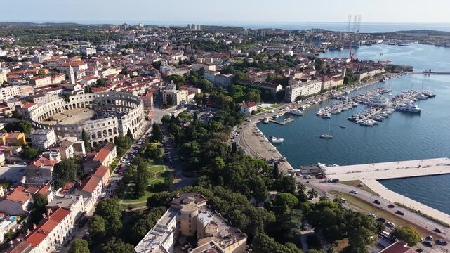 Aerial view of Pula Arena Roman amphitheater near harbour in Pula city, Croatia