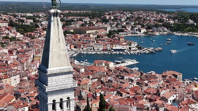 Drone shot close up of Church of St Euphemia bell tower in Rovinj, Croatia