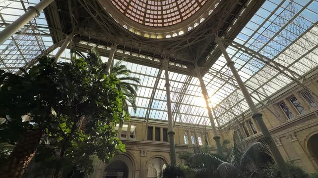 Winter Garden glass dome inside Ny Carlsberg Glyptotek in Copenhagen, Denmark