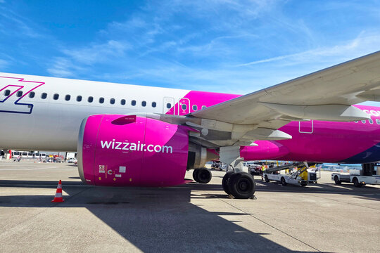 Basel, Switzerland, May 22, 2026: Vibrant Airline Scene with Wizz Air Aircraft on Tarmac for Travel and Transportation Concept