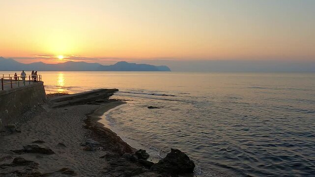Sunset at the beach in Aspra, Sicily. Italy