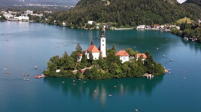 Bird's-eye view of Lake Bled Island Church surrounded by mountains, Slovenia