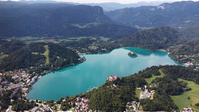 Wide aerial view of Lake Bled, Castle, Island and surrounding valley, Slovenia