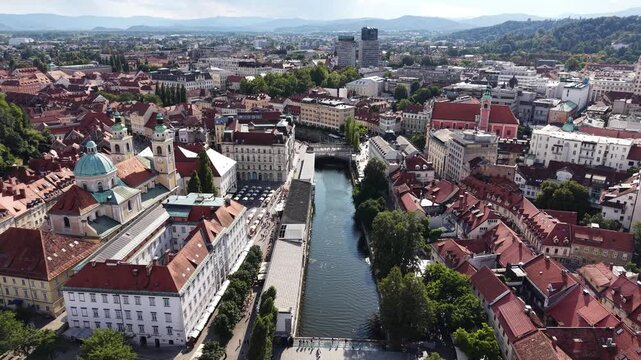 Aerial view of Ljubljanica river winding through old town Ljubljana, Slovenia