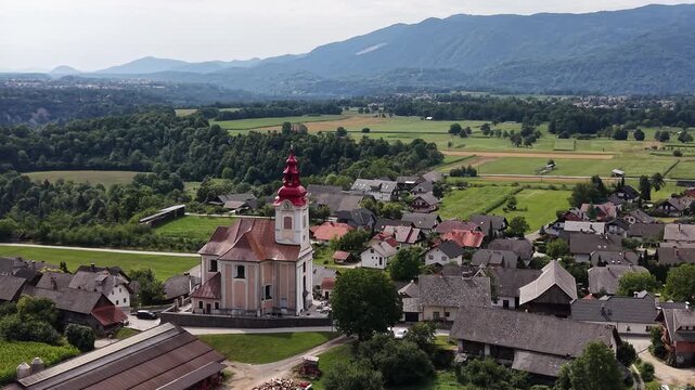 Drone shot of St John the Baptist Church in Zasip village, Slovenia