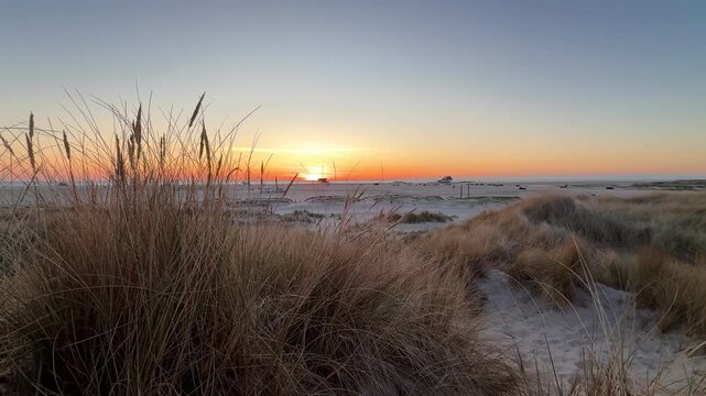 amazing sunset over the North Sea beach