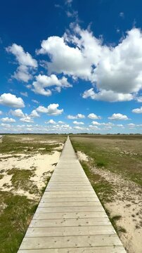 path to the sea with beautiful clouds
