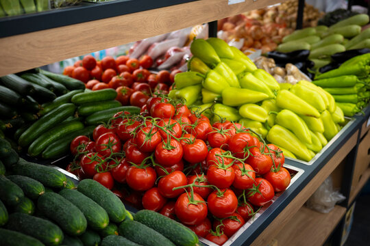 Fresh Tomatoes Cucumbers and Peppers Displayed at Grocery Market in Yerevan
