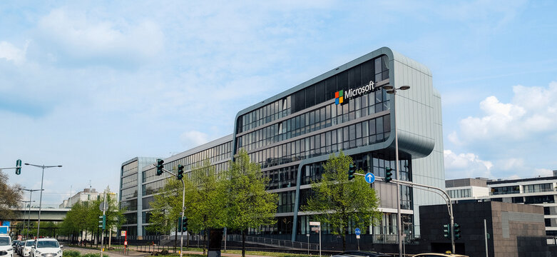 Microsoft office building stands in Cologne Germany during a clear day with clouds - Germany. Cologne 18-04-2026