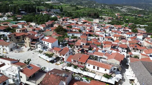 Aerial view of Omodos central cobblestone square and Monastery of the Holy Cross, Cyprus