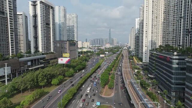 Aerial View of Modern Boulevard and Urban Skyline in Ho Chi Minh City