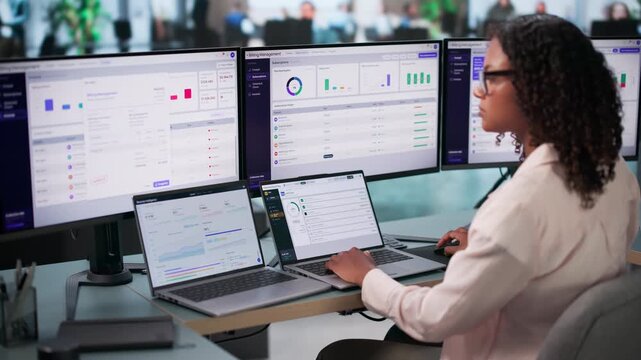 Software Manager Analyzing Subscription Billing Data On Laptop