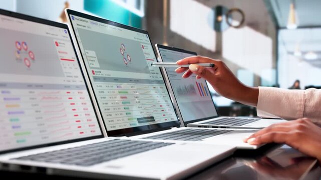Fraud Analyst Reviews Suspicious Transaction Patterns On Laptop