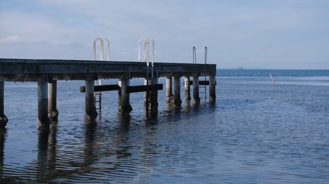Seaholme Jetty features&nbsp;swimming ladders, extending into the calm waters of Port Phillip Bay in Seaholme, Melbourne, Australia.&nbsp;
