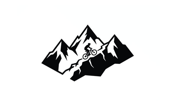 Mountain Biker Silhouette Riding on Rocky Mountain Peaks