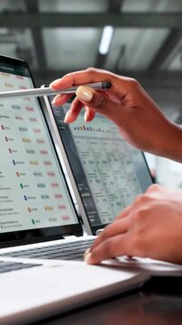 Regulatory Compliance Manager Reviews Audit Findings On Laptop