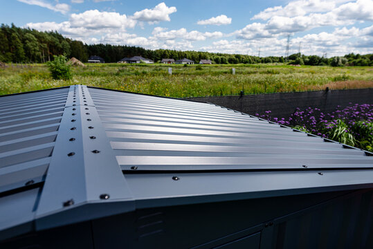 Corrugated metal roof on a modern storage shed