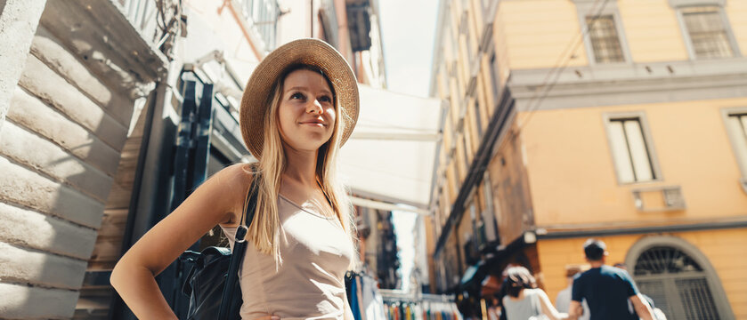 Young Female Tourist with Backpack and Smartphone Enjoying Panoramic View of Rome