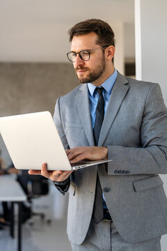 Successful lawyer in business suit smiling confidently, representing legal advice, law expertise