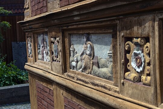 Scenes and buildings at the historic old town of Alfeld Germany. Decorative woodcarving.