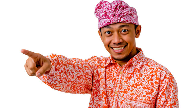 A man wearing a pink and white headscarf and an orange and white patterned shirt