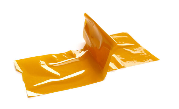 Yellow crumpled adhesive repair tape isolated on white background, side view, design element, clipping path