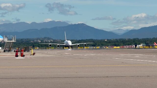 Airbus A380 Taxiing at the Airport in the Distance - Sunny Day