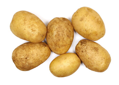 Whole organic potatoes isolated on white bacground, top view