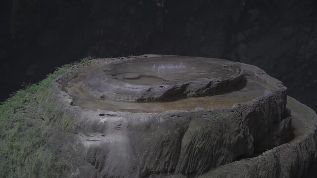 Closeup shot of iconic stalagmite in Son Doong with raindrop