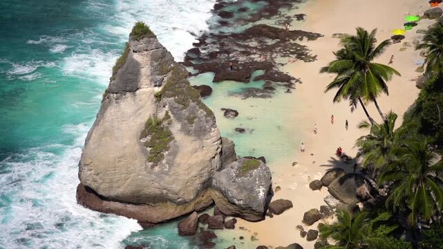 Drone view of tropical cove and limestone cliffs in Nusa Penida