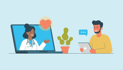 Fototapeta premium Young male patient using tablet to have online medical consultation with female doctor displaying virtual red heart icon.