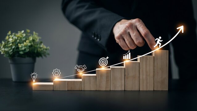 Businessman hand placing wooden block step on ascending growth chart as concept for professional progress strategy success development career achievement motivation target planning.