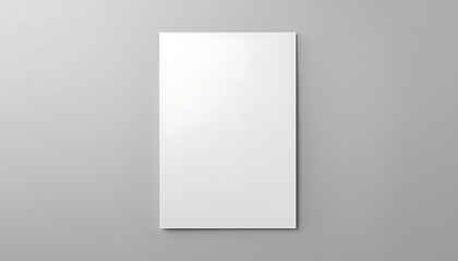 Fototapeta premium Blank white paper sheet mockup on a grey background