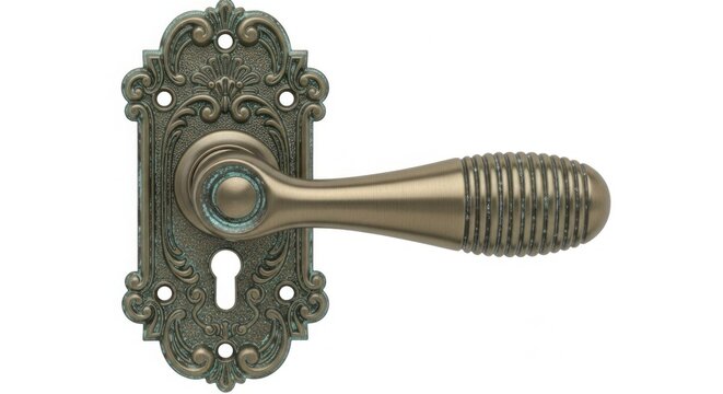 An ornate antique brass door handle with a decorative backplate isolated on a clean white background for architectural design