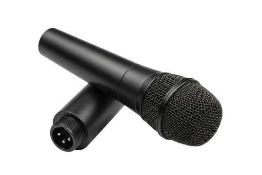 Black dynamic microphone laying on black background.