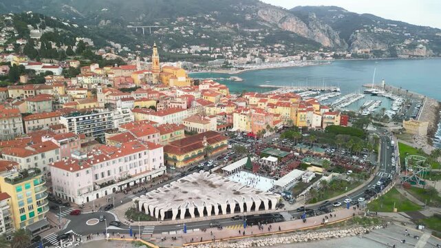 Aerial view of Menton France showcasing Mediterranean coastline and historic town from above