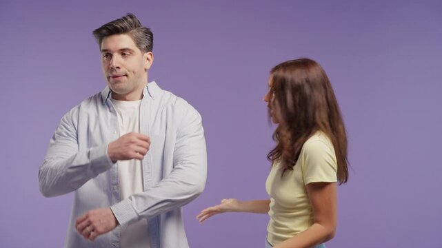 Furious young woman screaming at her partner with intense anger while man dismisses her words. Explosive argument, emotional outburst, relationship conflict, communication breakdown and toxic interact