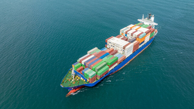 Large container ship at sea. Aerial view of cargo container ship vessel import export container sailing.
