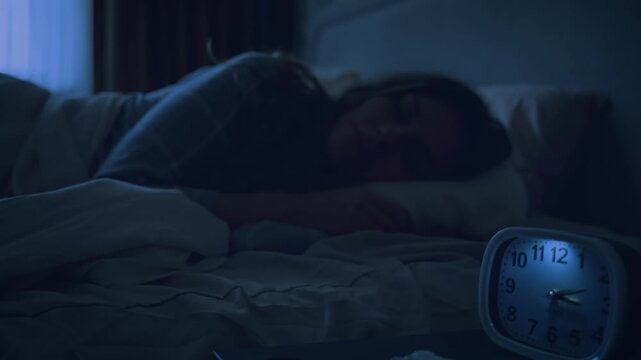 portrait silhouette happy young caucasian woman sleeps sweetly. lady after taking sleeping pills, deep night dark home cozy room. peaceful girl lying in bed good healthy sound sleep rest relax calm